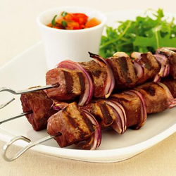 Chargrilled beef skewers with tomato vinaigrette